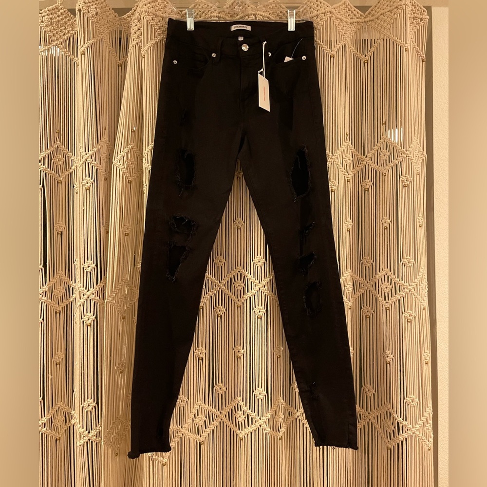Good American - Good Legs. High waisted, distressed, frayed ends skinny jeans.